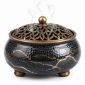 Brûle-parfum rond 18 cm en céramique noir et doré avec couvercle ajouré décoratif