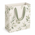 Sac cadeau 26 x 12 x 32 cm en papier blanc vert à motif végétal avec anses textile